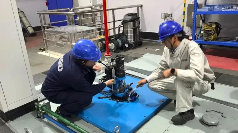 NSD Electric engineers working on the localized main distributing valve retrofit at Xiaowan Hydropower Station