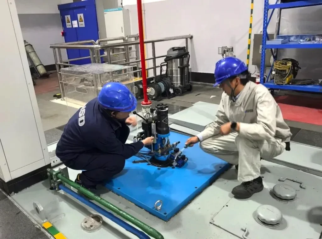 NSD Electric engineers working on the main distributing valve retrofit at Xiaowan Hydropower Station